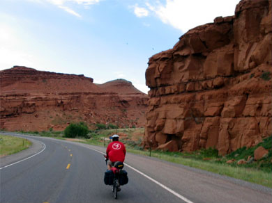 Steve riding through some red rocks