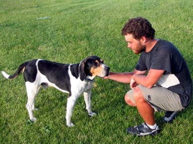 Mickey petting the dog that peed on everything it saw